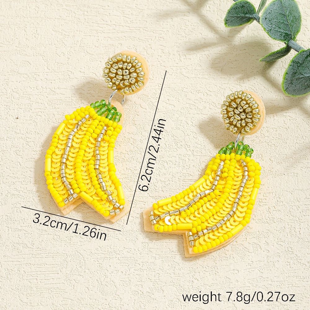 Boucles d'oreilles banane en perles jaunes 6,2 x 3,2 cm - Seven Shades Réunion