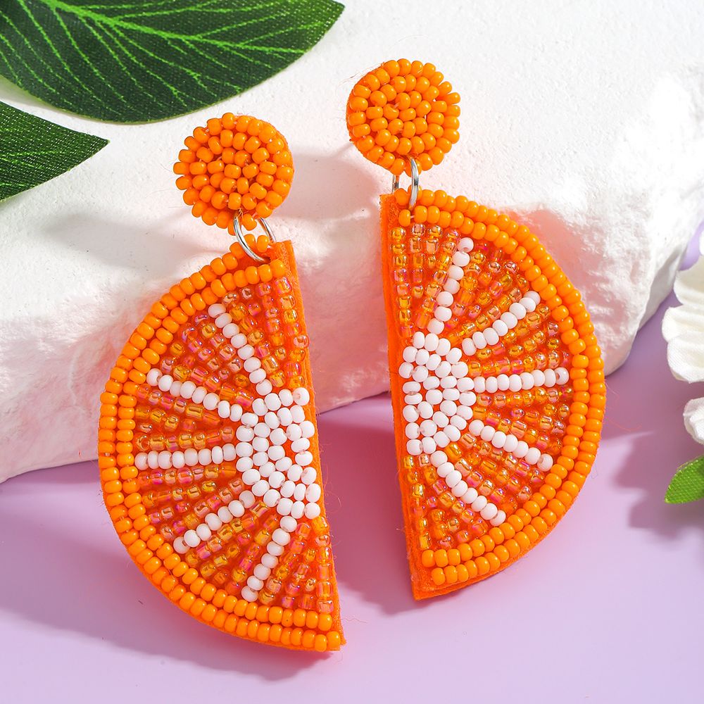 Boucles d'oreilles tranche d'orange brodées de perles - Seven Shades Réunion